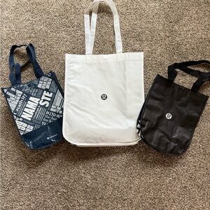 Lululemon Black, White, and Navy Tote Trio